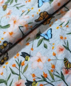 vlinders blomen gemeleerd grijs katoenen tricot