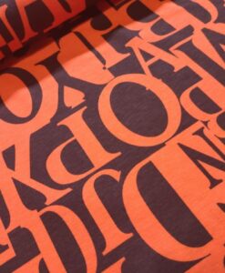 letters oranje zwart viscose tricot